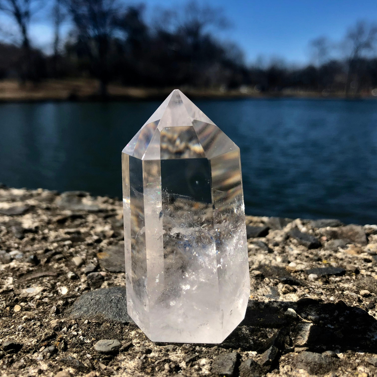 Clear hexagonal quartz crystal showing its purity and crystalline structure